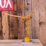 Antique toy large crane with driver