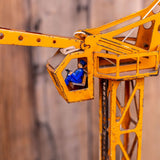 Antique toy large crane with driver
