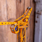 Antique toy large crane with driver