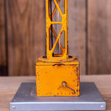 Antique toy large crane with driver