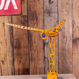 Antique toy large crane with driver