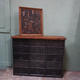 Antique console table with 15 industrial-style drop-leaf compartments, Bauche brand, circa 1950
