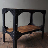 industrial metal console table in riveted solid oak