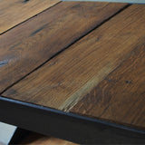 industrial metal console table in riveted solid oak