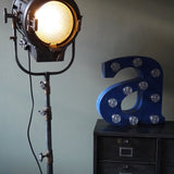 Vintage Hollywood Richardson cinema projector, 1930s/40s, with tripod and wheels