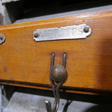 wooden and metal kitchen towel rack