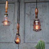 lustre de 3 baladeuse industrielle des USA equipant les caves de new York