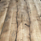 Industrial table with antique solid oak top and cast iron base with American patina