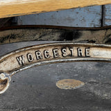 Industrial table with antique solid oak top and cast iron base with American patina