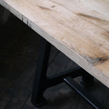 Large industrial table with solid oak top and cast iron base